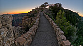 The paved pathway between Bright Angel Point and the visitor center at Grand Canyon North Rim at twilight, Grand Canyon National Park, UNESCO World Heritage Site, Arizona, United States of America, North America\n