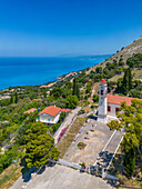 Aerial view of Greek Orthodox Church and coastline near Zola, Kefalonia, Ionian Islands, Greek Islands, Greece, Europe\n