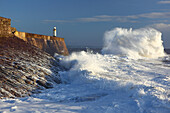 Storm waves at Porthcawl Pier, South Wales, United Kingdom, Europe\n