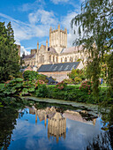 Reflection of the Cathedral in the Moat, The Bishop's Palace, Wells, Somerset, England, United Kingdom, Europe\n