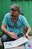 Santi Balmes, Spanish indie-pop musician and writer, front man of the band Love of Lesbian, signing his books in Zaragoza, Spain\n