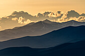 USA, Idaho, Bellevue, Clouds above mountains at sunset\n