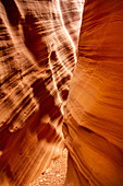 The sculpted High Spur slot canyon in the Orange Cliffs of the Glen Canyon National Recreation Area in Utah.\n