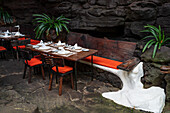 Restaurant at Jameos del Agua, a series of lava caves and an art, culture and tourism center created by local artist and architect, Cesar Manrique, Lanzarote, Canary Islands, Spain\n