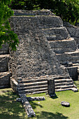 Structure A-3 with its stela and altar in the Mayan ruins in the Xunantunich Archeological Reserve in Belize.\n