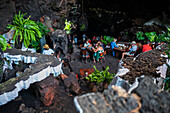 Cafe at Jameos del Agua, a series of lava caves and an art, culture and tourism center created by local artist and architect, Cesar Manrique, Lanzarote, Canary Islands, Spain\n