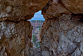 A gap between a stack of balanced boulders on a cliff east of Grandview Point at Grand Canyon South Rim, Grand Canyon National Park, UNESCO World Heritage Site, Arizona, United States of America, North America\n