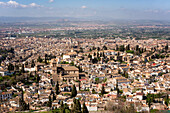 Granada city viewed on a sunny day from a viewpoint, Granada, Andalusia, Spain, Europe\n