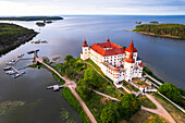 Lacko Castle at sunset, aerial view, Kallandso island, Vanern lake, Vastra Gotaland, Sweden, Scandinavia, Europe\n