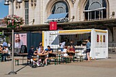 France, Paris, Gare de Lyon railway station, the square, container snacking\n
