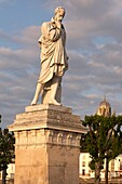 France, Charente Maritime, Saintonge, Saintes, Bernard Palissy statue and St. Peter Cathedral in the background\n