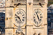 France, Paris, the bell tower and the clock of the Saint Etienne du Monts church\n