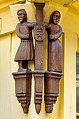 France, Morbihan, Josselin, medieval village, set of wooden statues on the facade of the café Le Alzey\n