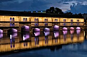 France, Bas Rhin, Strasbourg, old town listed as World Heritage by UNESCO, Vauban dam on the river Ill, illumination at night\n