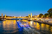 France, Paris, area listed as World Heritage by UNESCO, Flyboat and Alexandre III Bridge\n