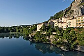 France, Alpes de Haute Provence, Sisteron, the Durance river, the Baume bridge and rock, Saint Dominique church\n