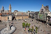 France, Nord, Lille, Place du General De Gaulle or Grand Place, statue of the goddess on its column with the old stock exchange and the belfry of the Chamber of Commerce and Industry in the background\n
