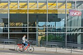 France, Meurthe et Moselle, Nancy, cyclist in front of Nancy Ville train station\n
