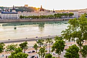 France, Rhone, Lyon, historical site listed as World Heritage by UNESCO, quay Victor Augagneur, Rhone River banks with a view of Hotel Dieu and Notre Dame de Fourviere Basilica\n