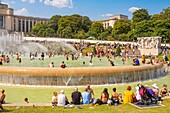 France, Paris, area listed as World Heritage by UNESCO, the Trocadero gardens during hot days, bathing and water cannon\n