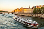 France, Paris, area listed as World Heritage by UNESCO, the Conciergerie and a fly boat\n