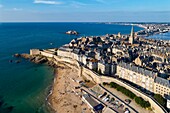 France, Ille et Vilaine, Cote d'Emeraude (Emerald Coast), Saint Malo, the walled city and the rampart, beach of Bon Secours (aerial view)\n