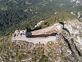 France, Ariege, Pays d'Olmes, Cathar Castle of Montsegur perched on a rock (aerial view) (aerial view)\n