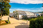 France, Paris, Auteuil, tennis court surrounded by tropical greenhouses\n