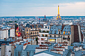 France, Paris, general view of Paris and the Eiffel Tower from a Rooftop of the 18th arrondissement (© SETE illuminations Pierre Bideau)\n