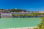 France, Rhone, Lyon, historical site listed as World Heritage by UNESCO, quay Victor Augagneur, Rhone River banks with a view of Hotel Dieu and Notre Dame de Fourviere Basilica\n