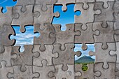 France, Puy de Dome, Volvic, Regional Natural Park of the Auvergne Volcanoes, the Chaine des Puys, listed as World Heritage by UNESCO, The Puy de Dome seen through Rassembler, a giant stone puzzle of Volvic, work of Thierry Courtadon\n