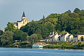France, Maine-et-Loire, Loire Valley listed as World Heritage by UNESCO, Montsoreau, labelled Les Plus Beaux Villages de France (The Most Beautiful Villages of France), Saint-Martin de Candes collegiate in the background\n