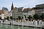 France, Bas Rhin, Strasbourg, old town listed as World Heritage by UNESCO, Place Kleber, pond, fountains, summer\n