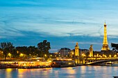 France, Paris, area listed as World Heritage by UNESCO, Rosa Bonheur barge, Alexandre III bridge and the Eiffel Tower\n