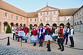 France, Cote d'Or, Beaune, listed as World Heritage by UNESCO, festivities during the sale of Hospices wines, folk group in front of the city hall\n