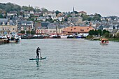 France, Calvados, Pays d'Auge, Deauville, paddle and Trouville sur Mer in the background\n