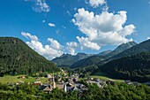 France, Haute Savoie, massif of Chablais, Abondance valley, Abondance, panoramic view of the village and the peak of the Corne and anti merlon anti stone falling protection of the village\n