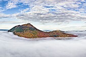 France, Puy de Dome, Orcines, Regional Natural Park of the Auvergne Volcanoes, the Chaîne des Puys, listed as World Heritage by UNESCO, the Puy de Dome volcano (aerial view)\n