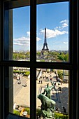 France, Paris, area listed as World Heritage by UNESCO, the statue Hercules taming a bison of Albert Pommier in front of the Chaillot palace and the Museum of Man (musee de l'Homme), Trocadero gardens and the Eiffel Tower\n