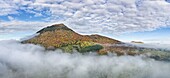France, Puy de Dome, Orcines, Regional Natural Park of the Auvergne Volcanoes, the Chaîne des Puys, listed as World Heritage by UNESCO, the Puy de Dome volcano (aerial view)\n