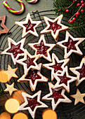 Christmas Linzer Cookies with Strawberry Jam and Powdered Sugar
