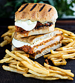 Chicken parmesan sandwich with french fries