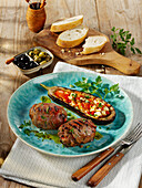 Grilled mince rolls with stuffed aubergines