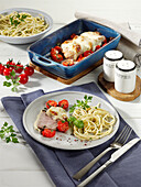 Baked pork fillet with baked tomatoes and spaghetti