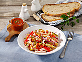 Hearty salad with sausage and vegetables