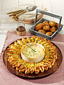 Potato puff pastry sun with oven cheese