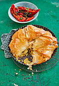 Courgette filo pie with roasted pepper salad