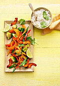 Stir-fry vegetables with bowl of rice