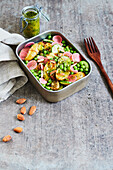 Potato and cucumber salad with radishes and herb vinaigrette