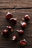 Chestnuts on a wooden table